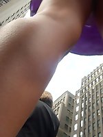 12 pictures - Chick upskirt, looking up purple skirt on the street