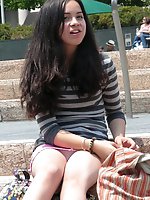 Upskirt pictures - Very hot brunette in mini, up skirts sitting