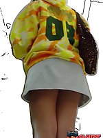 12 pictures - Coming closer to her tight ass. Close up upskirt pics