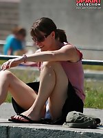 12 pictures - Cute babe in mini peeked. Real street upskirt