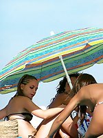 Upskirt pictures - A babe on open swim suit at the Paradise