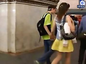 4 movies - Young beauty with a boyfriend. I decided to act quickly. I hoisted her yellow skirt and took some shots. She was in stockings and polka dot panties. S