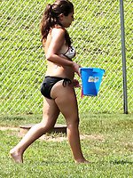 12 pictures - Girl playing her bikini thong