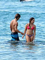 Upskirt pictures - Girls in bikinis lying and bent over