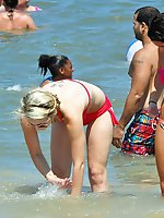 Upskirt pictures - Beach hunter admires sexy bikinis