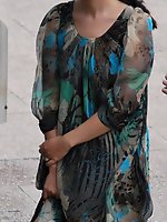 Upskirt pictures - Wind upskirt - Wind lifts her dress's skirt up